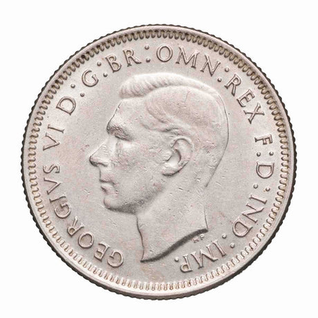 1942 Shilling about Uncirculated